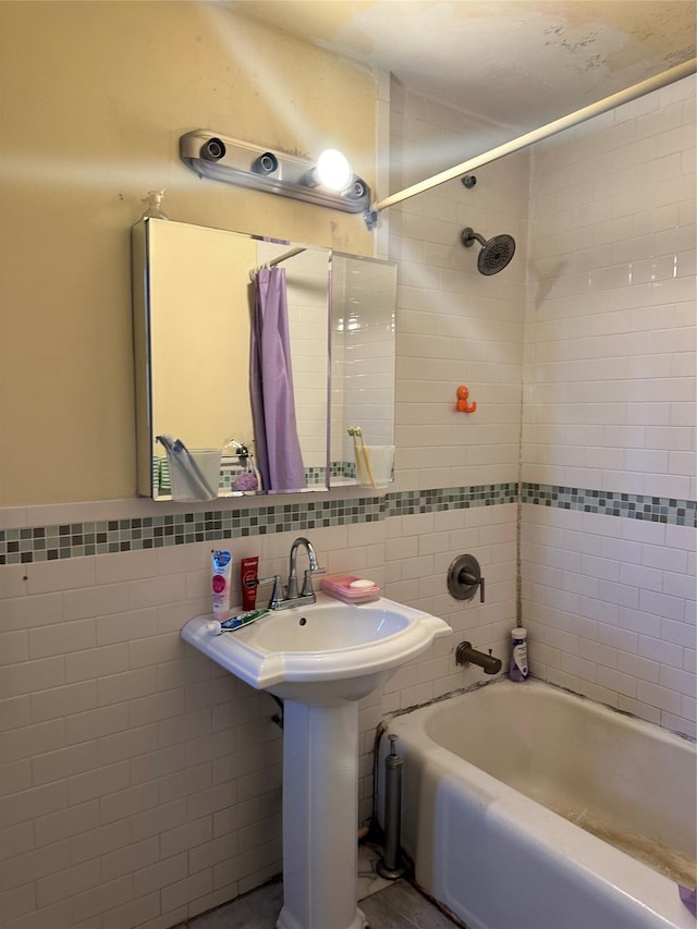 150-30 71st Ave Unit 4F, Kew Garden Hills, NY 11367 - bathroom featuring tile walls and shower / tub combo