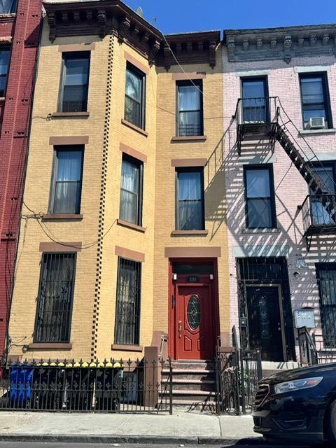 1018 Halsey St Hse, Unit Hse, Brooklyn, NY 11207 - photo 1