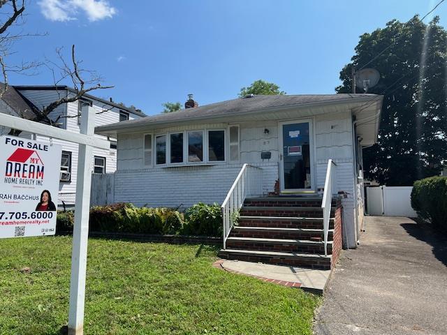 87 W Clinton Ave, Roosevelt, NY 11575 - photo 3