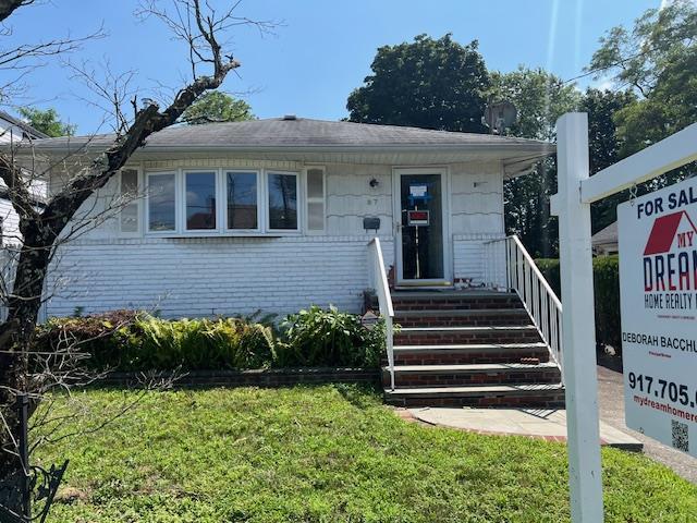 87 W Clinton Ave, Roosevelt, NY 11575 - photo 4