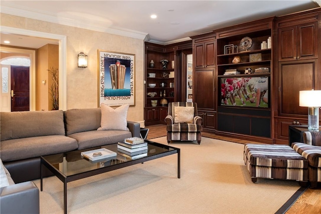 interior space featuring light wood-type flooring and crown molding