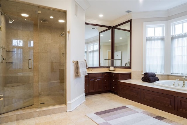 bathroom featuring tile patterned floors, vanity, ornamental molding, and shower with separate bathtub