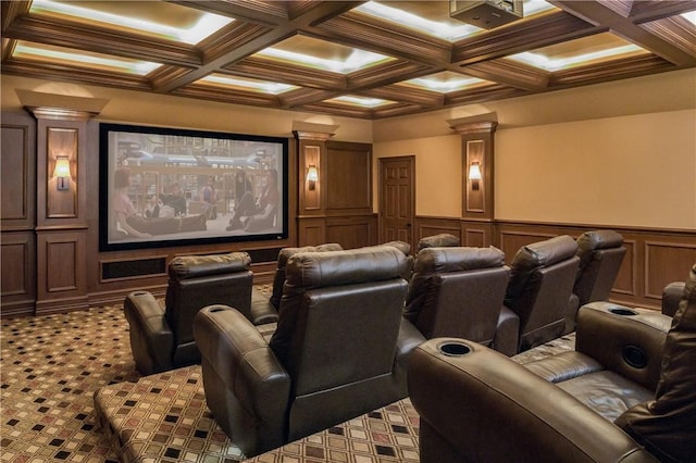 home theater featuring beamed ceiling, carpet floors, decorative columns, and coffered ceiling