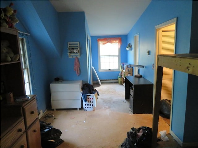 bedroom featuring a baseboard radiator and vaulted ceiling