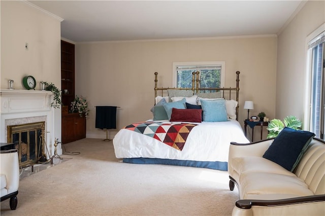 bedroom with carpet flooring, multiple windows, crown molding, and a premium fireplace