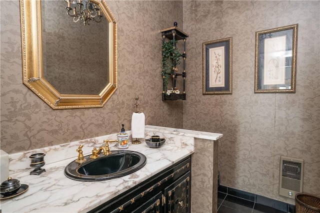 bathroom with tile patterned flooring and vanity