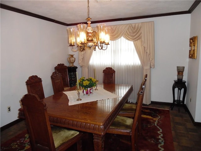 dining space featuring a chandelier and ornamental molding