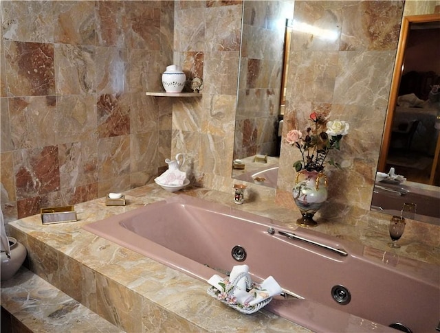 bathroom with tiled tub