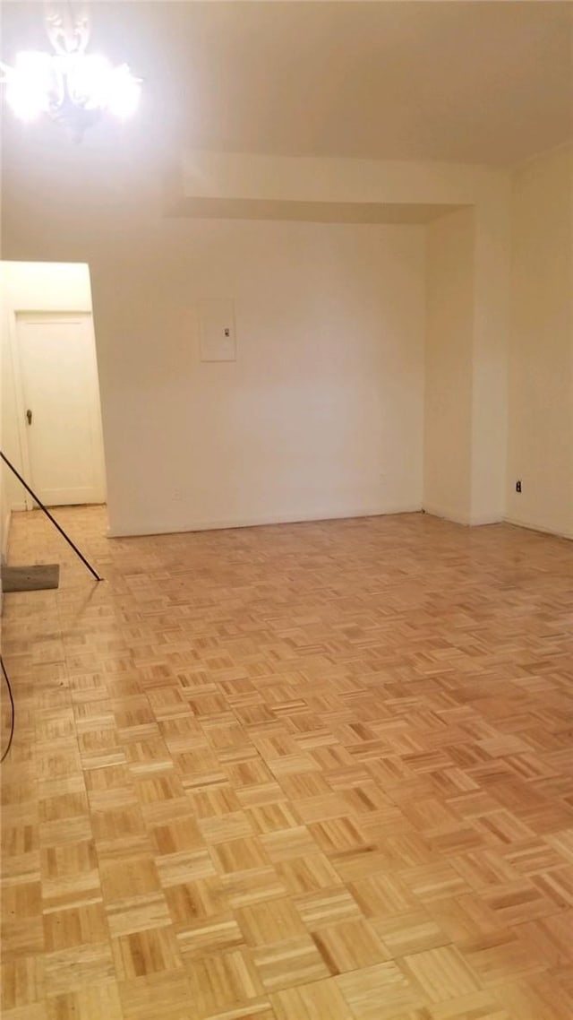 empty room featuring light parquet flooring