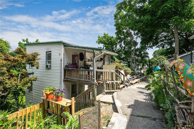 view of front of house featuring a deck