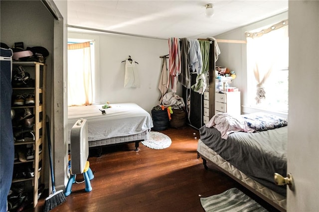 bedroom with hardwood / wood-style flooring