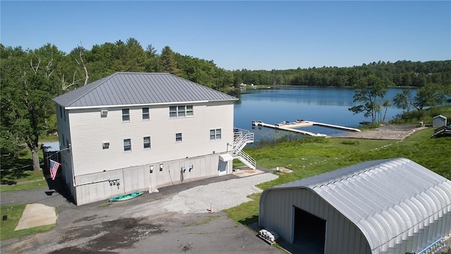 exterior space with a water view