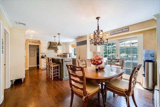 10 Evergreen Ct, Suffern, NY 10901 - dining room featuring a chandelier, dark wood finished floors, recessed lighting, ornamental molding, and baseboards
