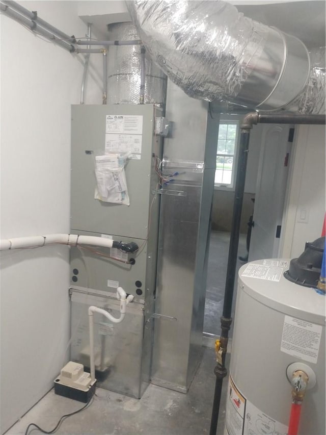 utility room with water heater