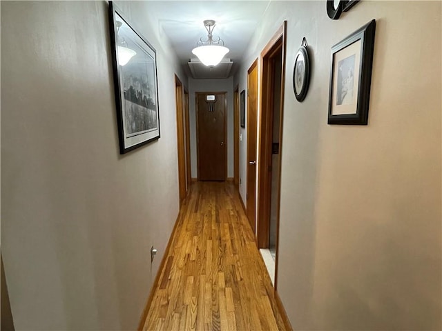 corridor featuring light wood-type flooring