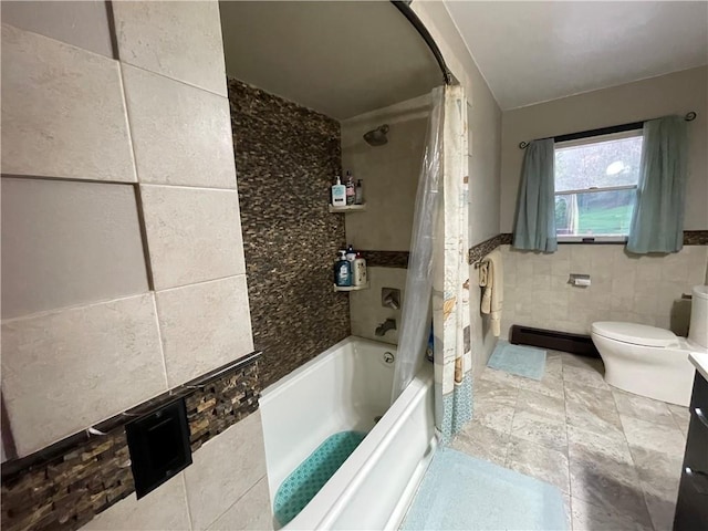 full bathroom featuring vanity, shower / bath combination with curtain, tile walls, and toilet