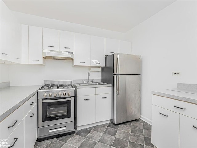 kitchen with sink, white cabinetry, and stainless steel appliances