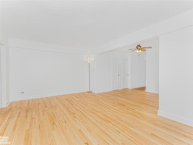 unfurnished room with light hardwood / wood-style floors