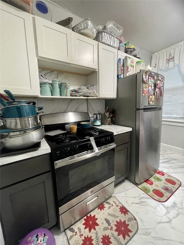 kitchen featuring white cabinets and stainless steel appliances