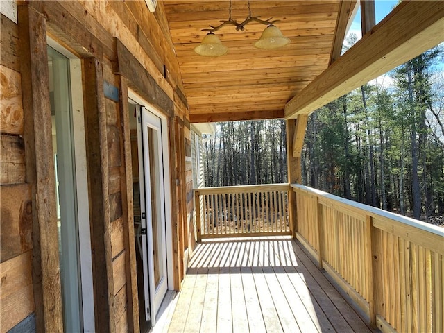 wooden deck with ceiling fan