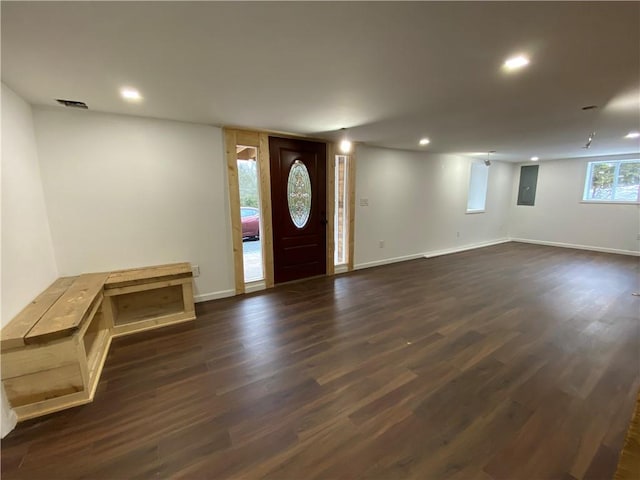 entrance foyer featuring dark wood-type flooring and electric panel