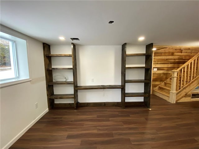 interior space with dark hardwood / wood-style floors