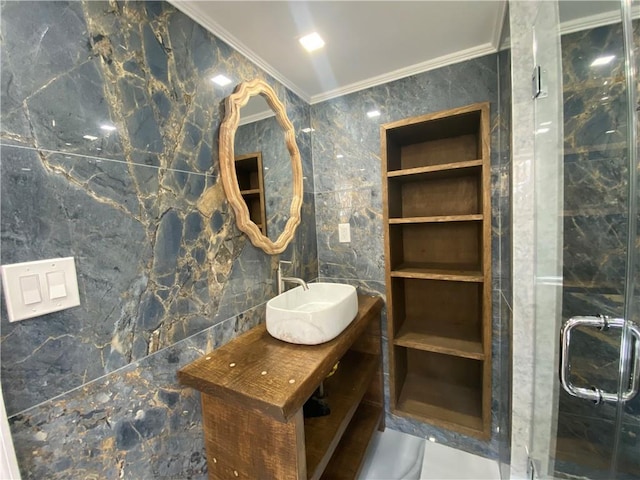 bathroom featuring sink, crown molding, built in features, tile walls, and walk in shower