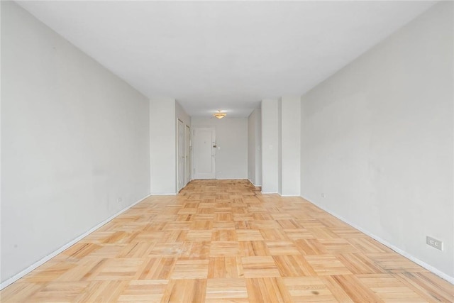 hall with light parquet floors