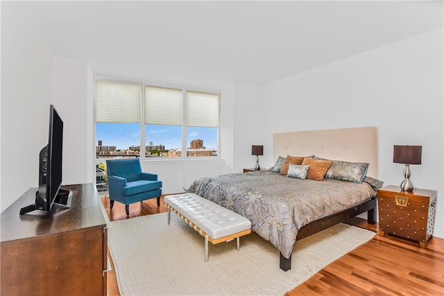 bedroom featuring wood-type flooring