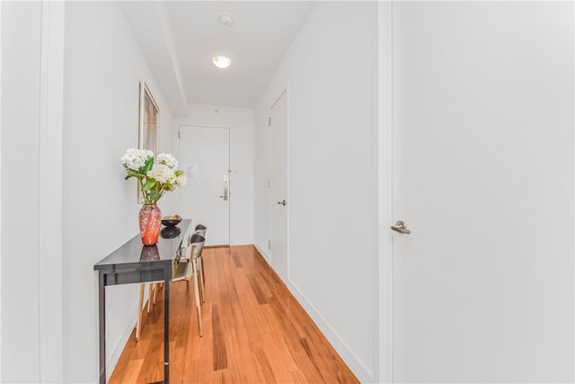 hallway featuring light wood-type flooring