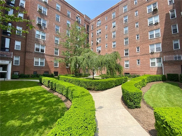 5645 Netherland Ave Unit 6D, Bronx, NY 10471 - view of community featuring a lawn