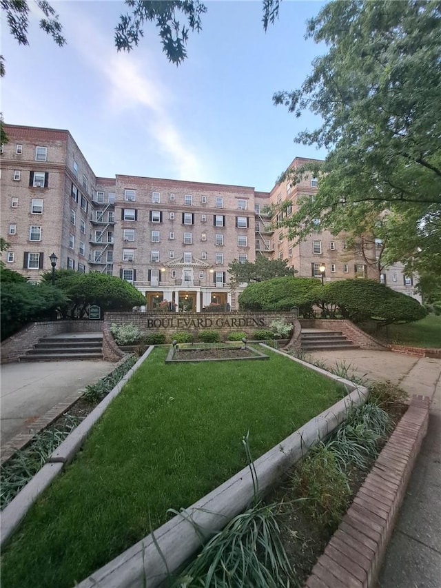 view of community featuring a lawn