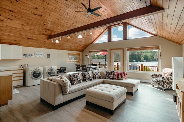 living room featuring wood ceiling, ceiling fan, beam ceiling, separate washer and dryer, and hardwood / wood-style floors