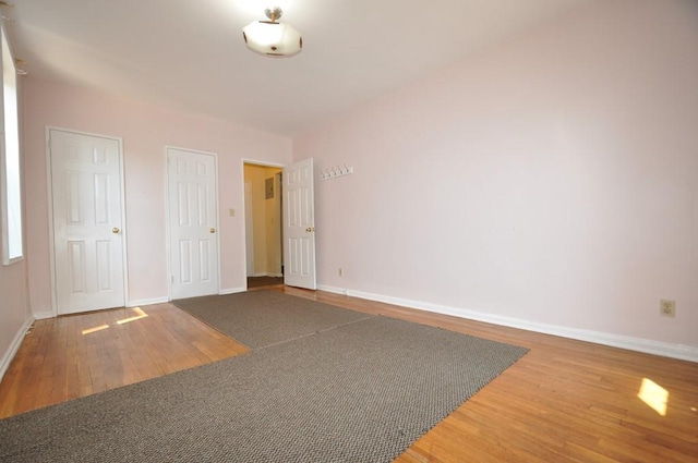 empty room featuring hardwood / wood-style flooring