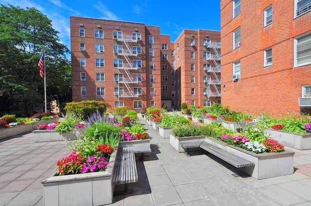 view of property's community with a patio area