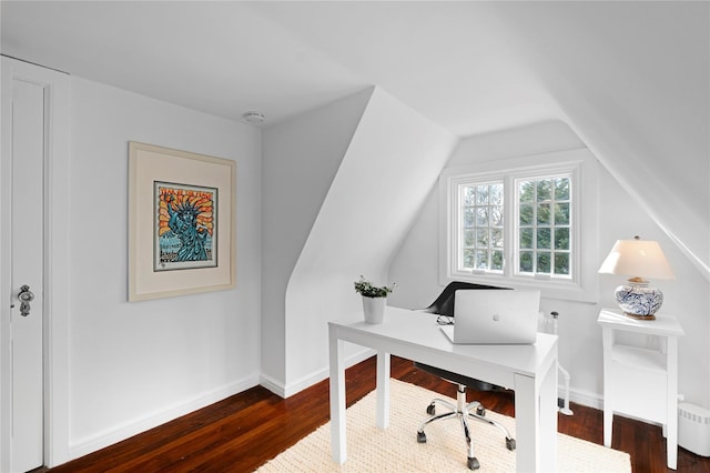 office with lofted ceiling and dark hardwood / wood-style floors