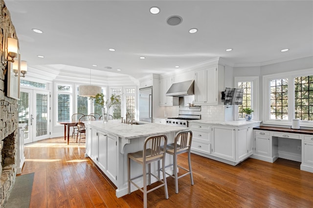 kitchen featuring white cabinetry and a center island