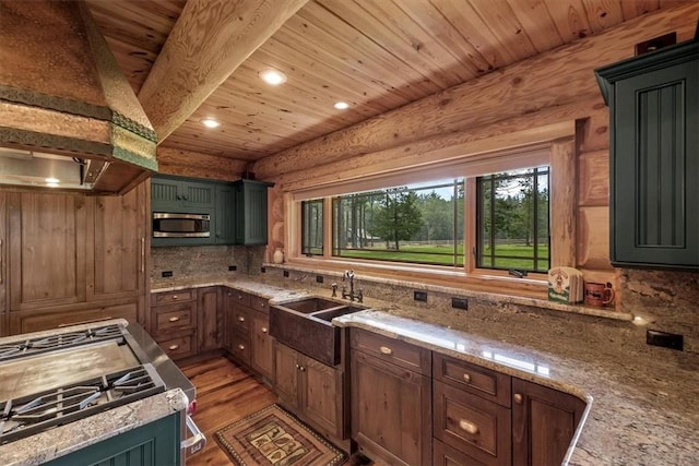 kitchen featuring dark hardwood / wood-style floors, stainless steel appliances, wooden ceiling, and sink