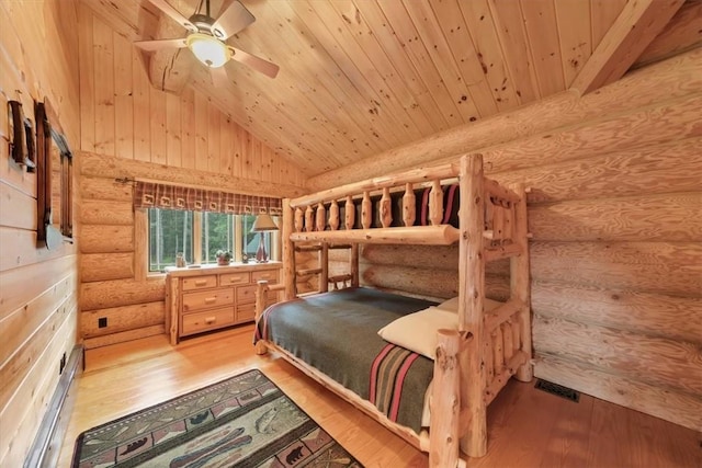 bedroom with hardwood / wood-style floors, ceiling fan, and wood ceiling