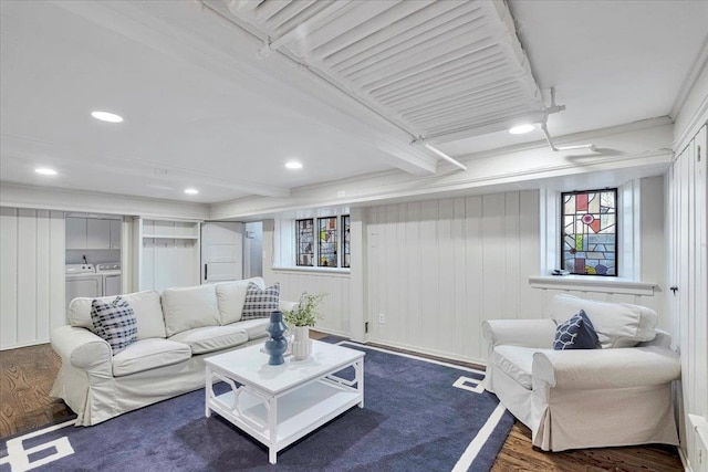 living area featuring recessed lighting, dark wood-style flooring, visible vents, beamed ceiling, and washer and clothes dryer