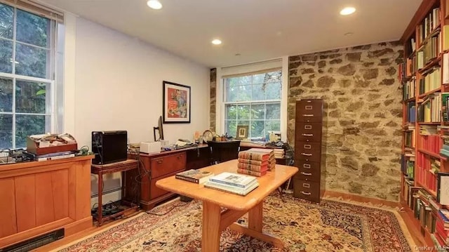 office with light wood-type flooring