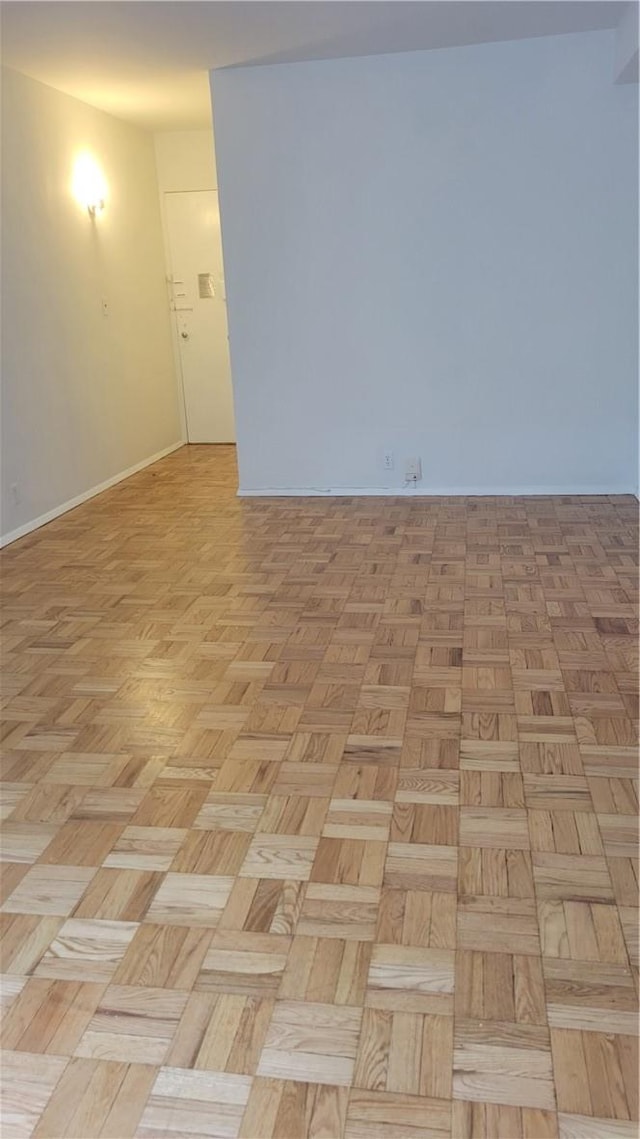 spare room featuring light parquet floors