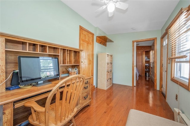143D Edgewater Park Unit D, Bronx, NY 10465 - office area featuring light wood-style floors, ceiling fan, baseboard heating, and healthy amount of natural light