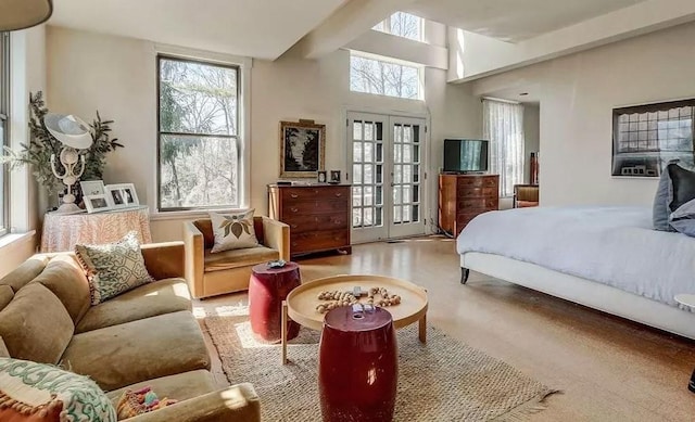 bedroom featuring access to exterior and french doors