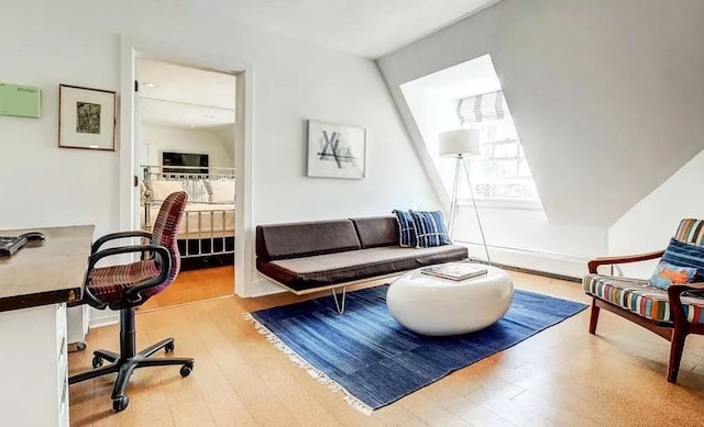 living room with light hardwood / wood-style floors