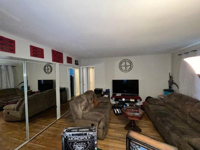 living room with wood-type flooring