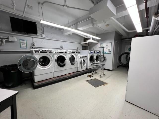 washroom with independent washer and dryer