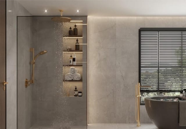 bathroom with shower with separate bathtub and tile walls