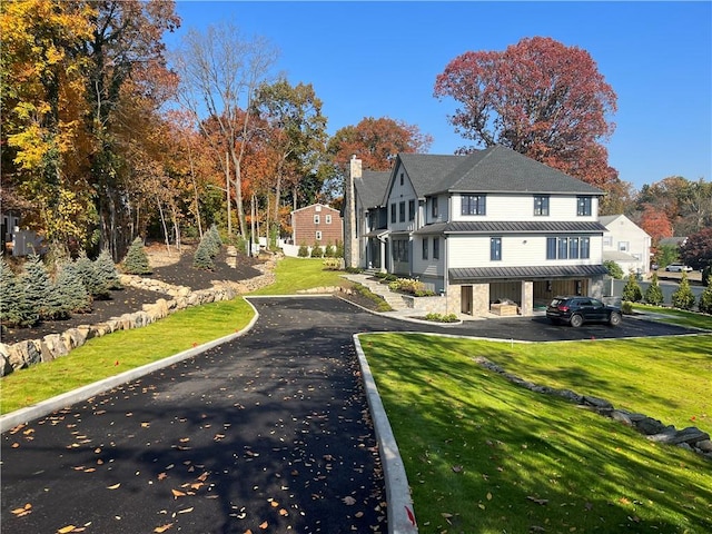 view of front of house featuring a front yard