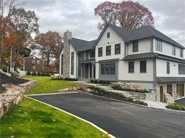 exterior space with a front yard